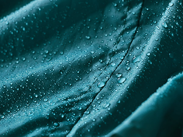 Reducing the environmental impact of waterproof breathable textiles