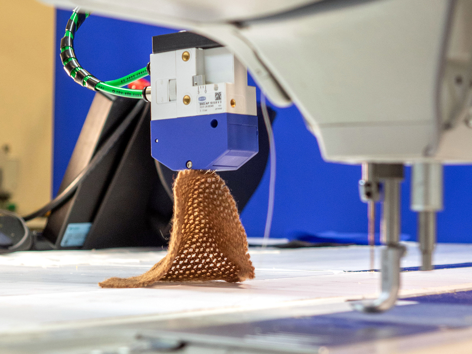 ADOTC to develop robotic sewing cells